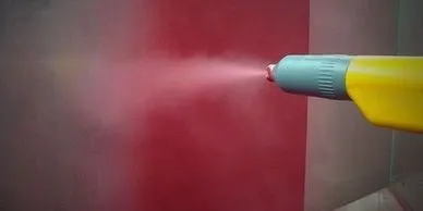 Powder coat primer gun being used